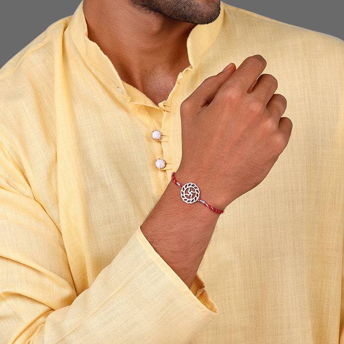 Silver Auspicious Rakhi : RK049