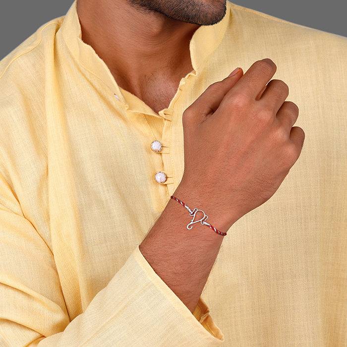 Silver Protector Of All Rakhi : RK091