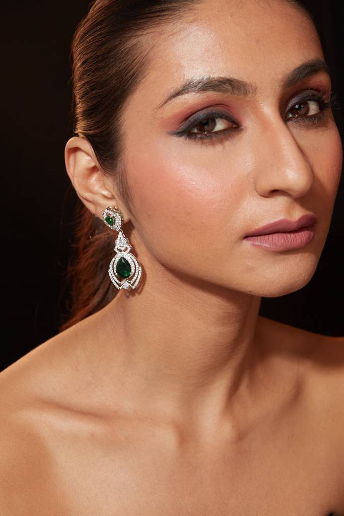 Rhodium Plated Zircon Studded With Green Synthetic Emerald Stone Dangle Earrings. : VE340