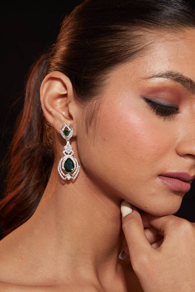 Rhodium Plated Zircon Studded With Green Synthetic Emerald Stone Dangle Earrings. : VE340