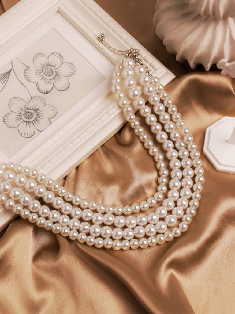 The Pearl Story - Ivory Strings Of Oyster Necklace : WFNS202