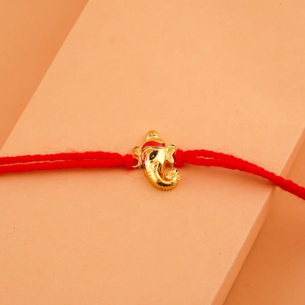 Dual Tone Om Ganesh Face Rakhi : ZLRH-1017TT