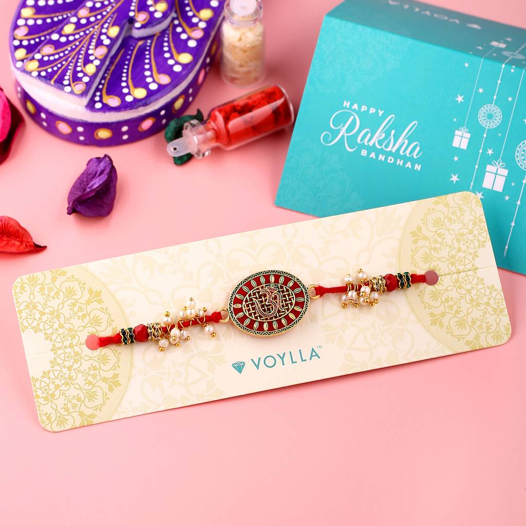 Om Pearl Enameled Rakhi With Roli Chaawal Pack : 8905124413281