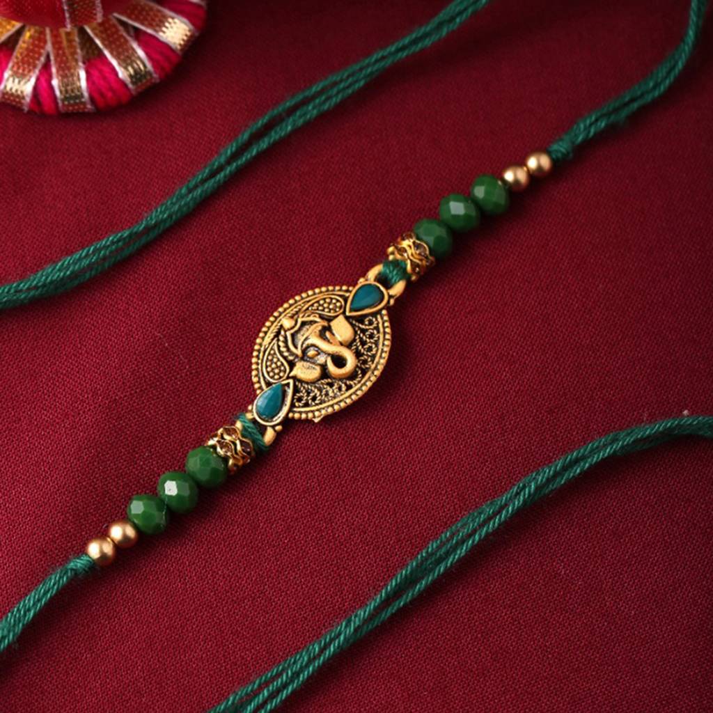 Lord Ganesha Rakhi With Rudraksha With Roli Chaawal Pack : 8905124413120