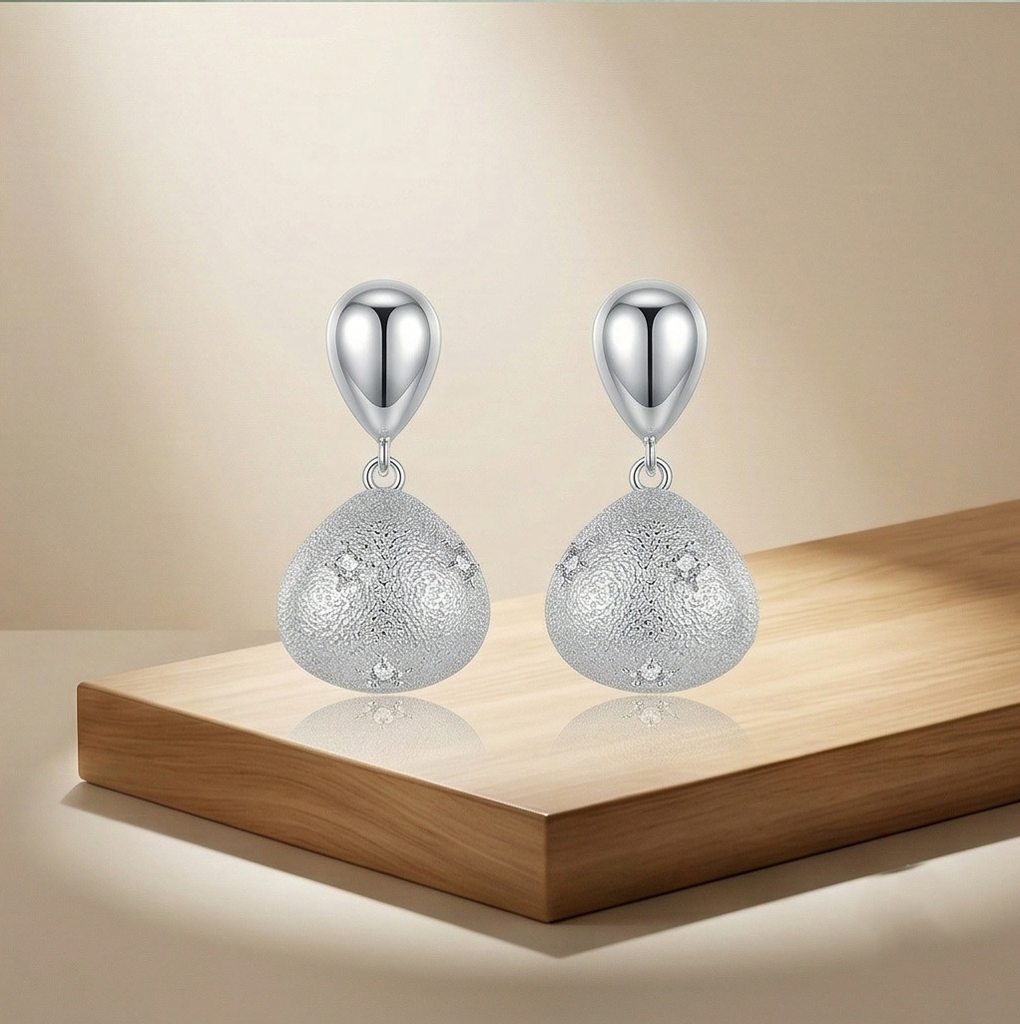 Luxe Collection - Textured Teardrop Dangle Earrings Rhodium Finish Statement Jewellery For Women : AGER0203081