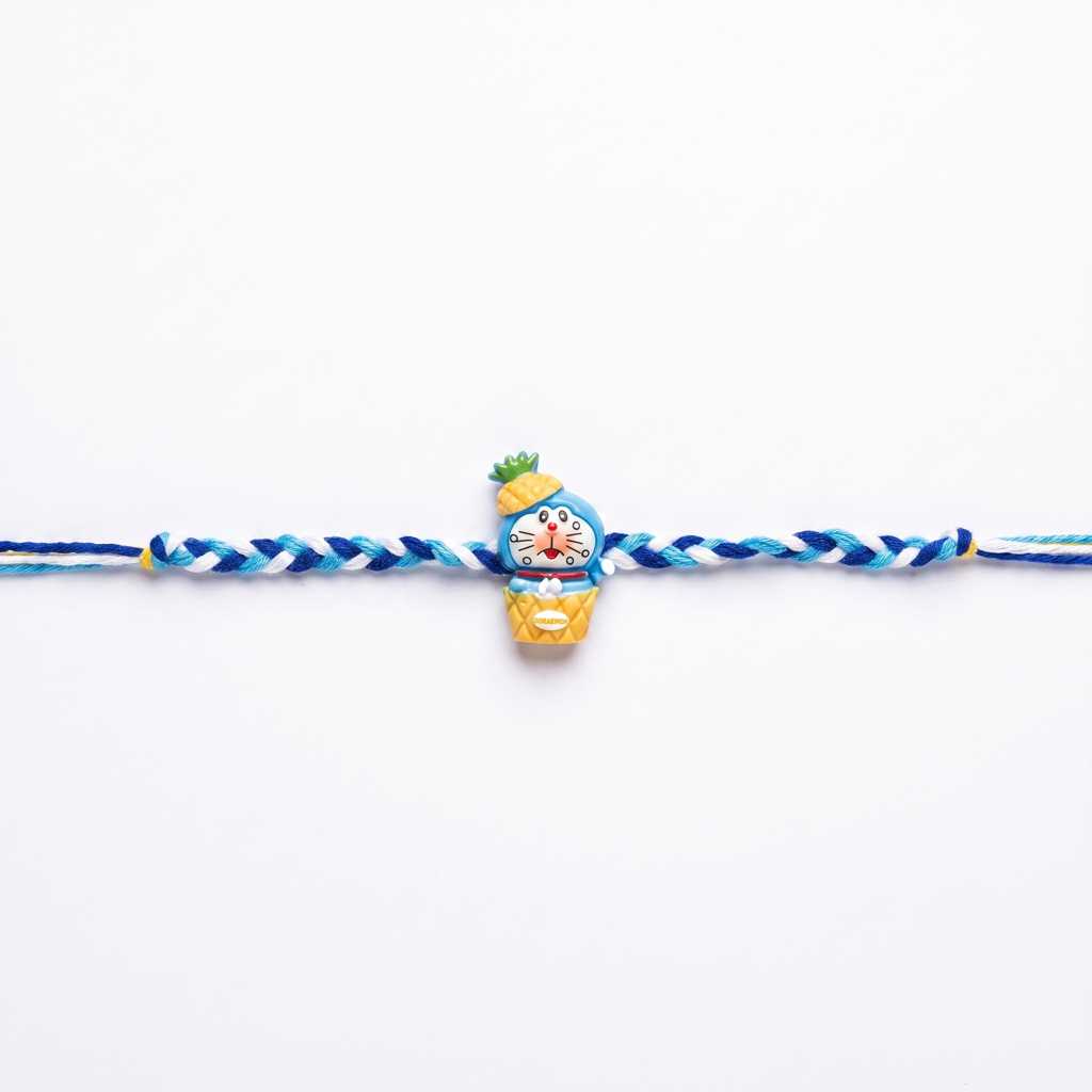 Doraemon With Pineapple Cap Blue Kids Rakhi : BV-AH-RKHI-KIDS-DORAEMON-PINEAPPLE-BLUE
