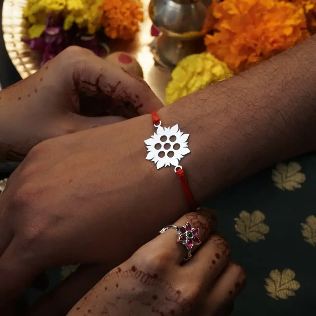 Silver Laser Cut Rakhi : 81846679