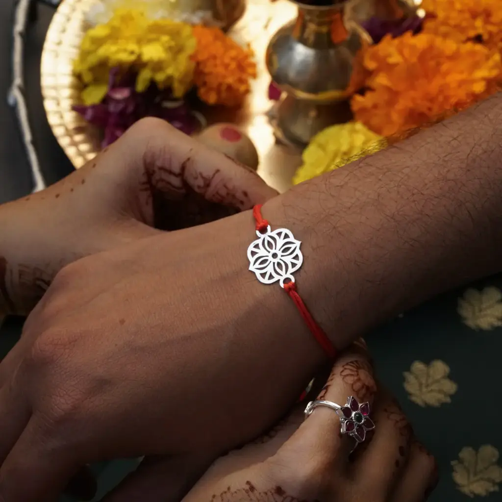 Silver Laser Cut Rakhi : 72147351