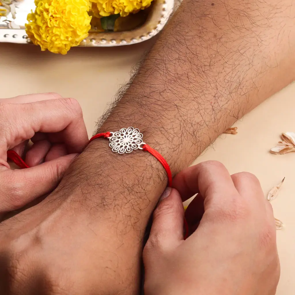 Silver Laser Cut Rakhi : 43065239