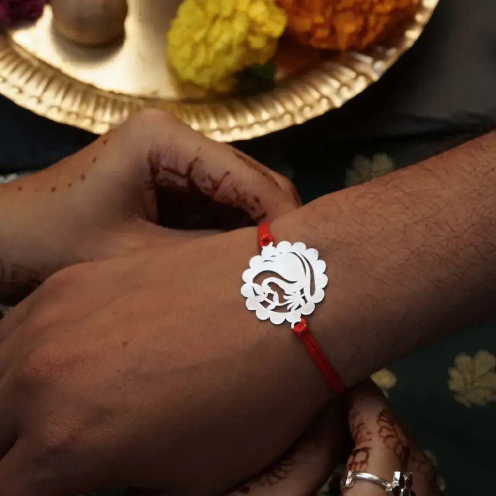 Silver Laser Cut Rakhi : 54370199