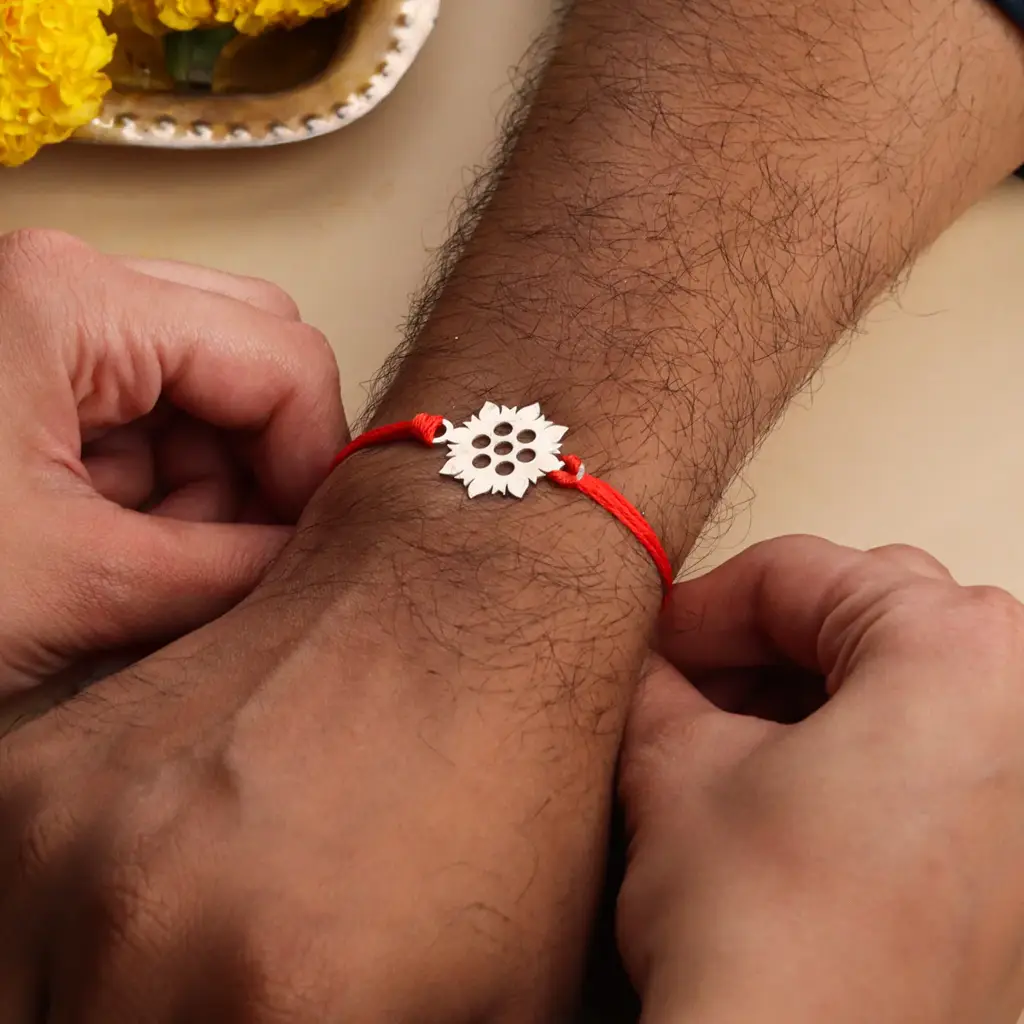 Silver Laser Cut Rakhi : 83427479