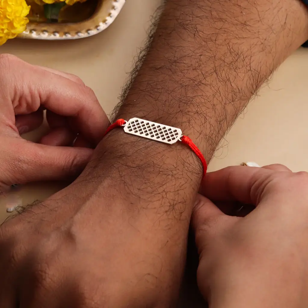Silver Laser Cut Rakhi : 95084951