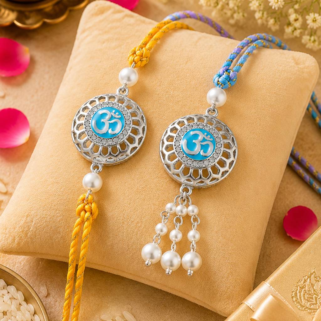Eternz Certified Jewellery - Estele Rhodium Plated Auspicious Om Rakhi Set For Brother & Bhabhi With Silk Thread