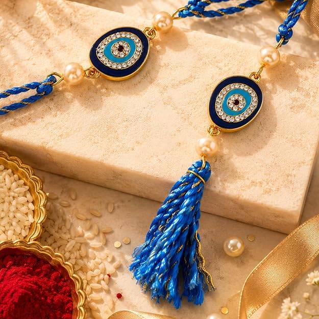Gold Plated Sacred Evil Eye Bhaiya Bhabhi Rakhi Set With Fancy Silk Thread : 282-IG-RAKHI