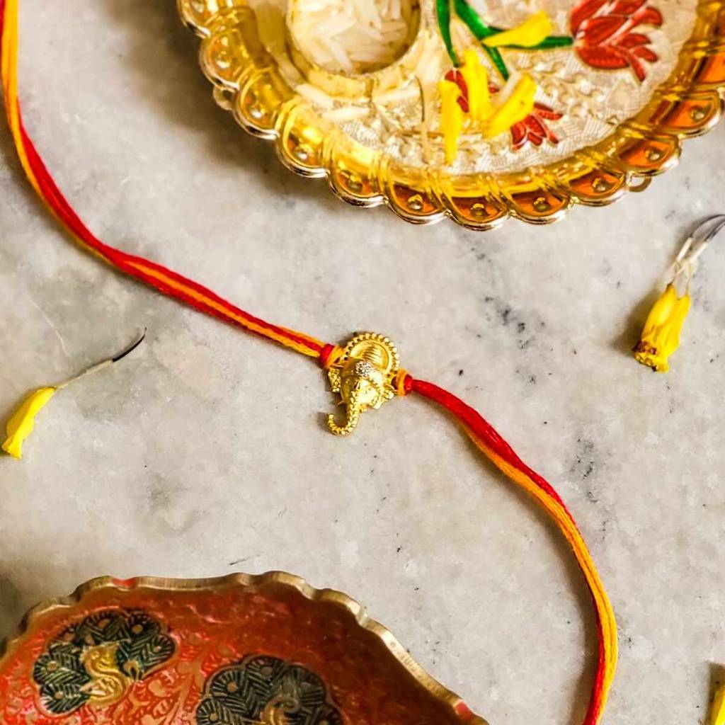 Divine Grace Ganesh Rakhi : RT082