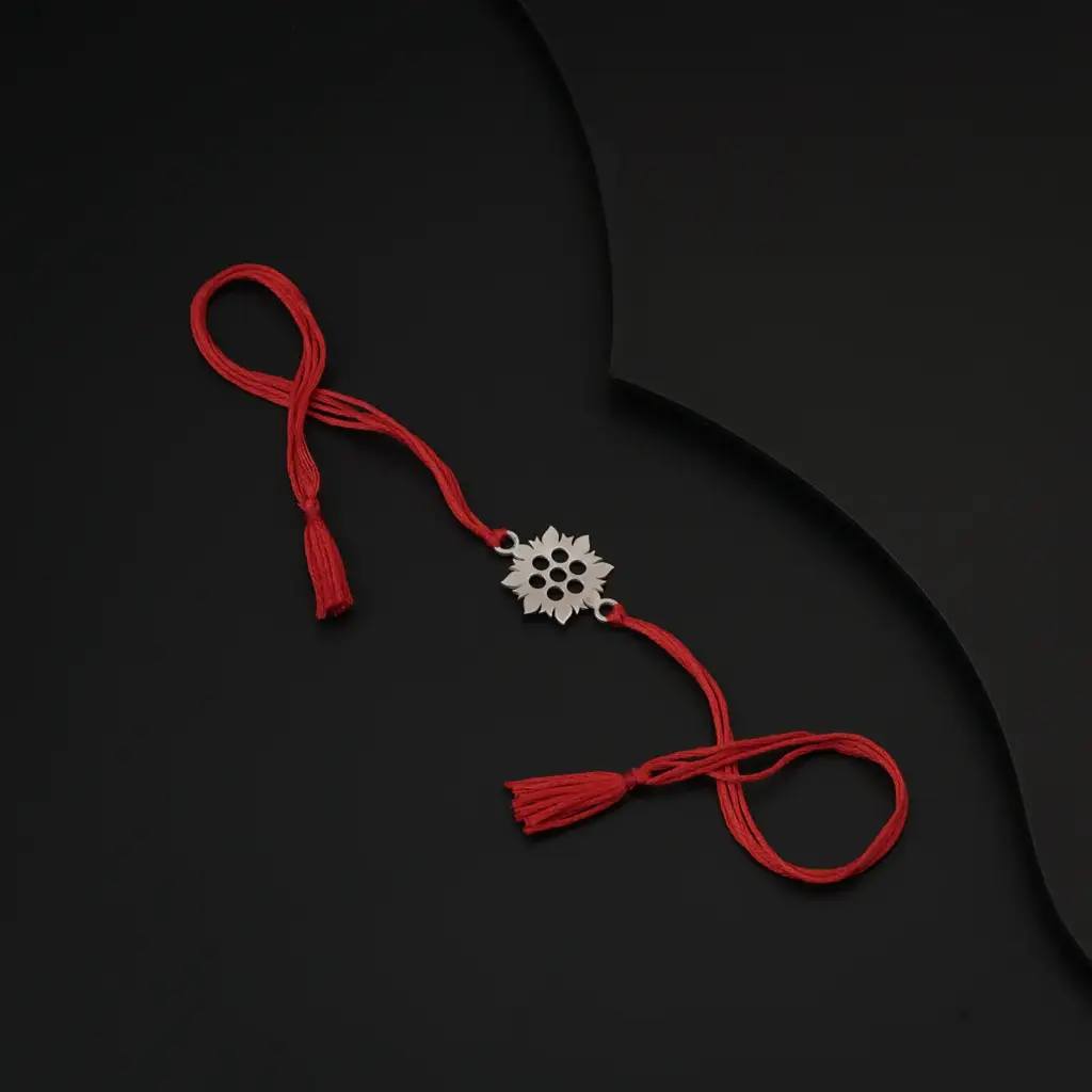 Silver Laser Cut Rakhi : 83427479