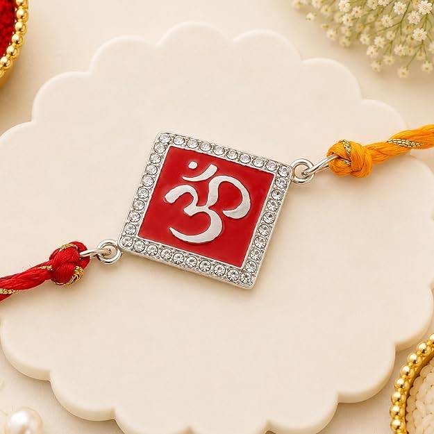Rhodium Plated Divine Red Om Rakhi With Enamel & Austrian Crystals With Multi Colored Silk Thread : 171-IG-RAKHI