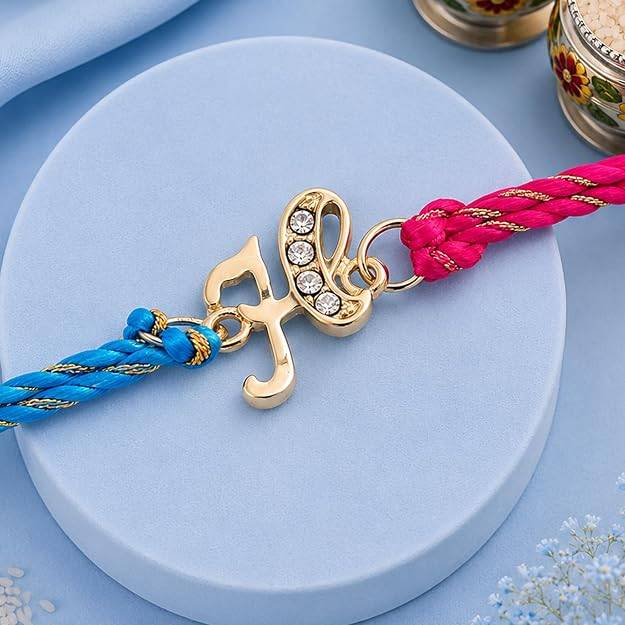 Gold Plated Opulent H Initials Rakhi With Austrian Crystals And Multi Colored Silk Thread : 198-IG-RAKHI