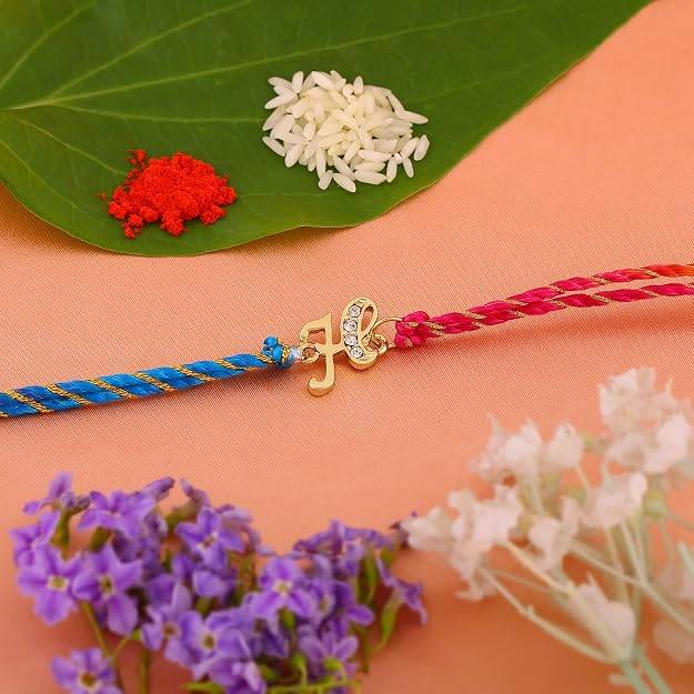 Gold Plated Opulent H Initials Rakhi With Austrian Crystals And Multi Colored Silk Thread : 198-IG-RAKHI