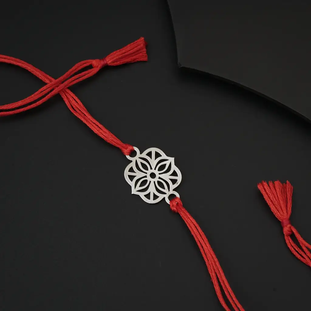 Silver Laser Cut Rakhi : 72147351