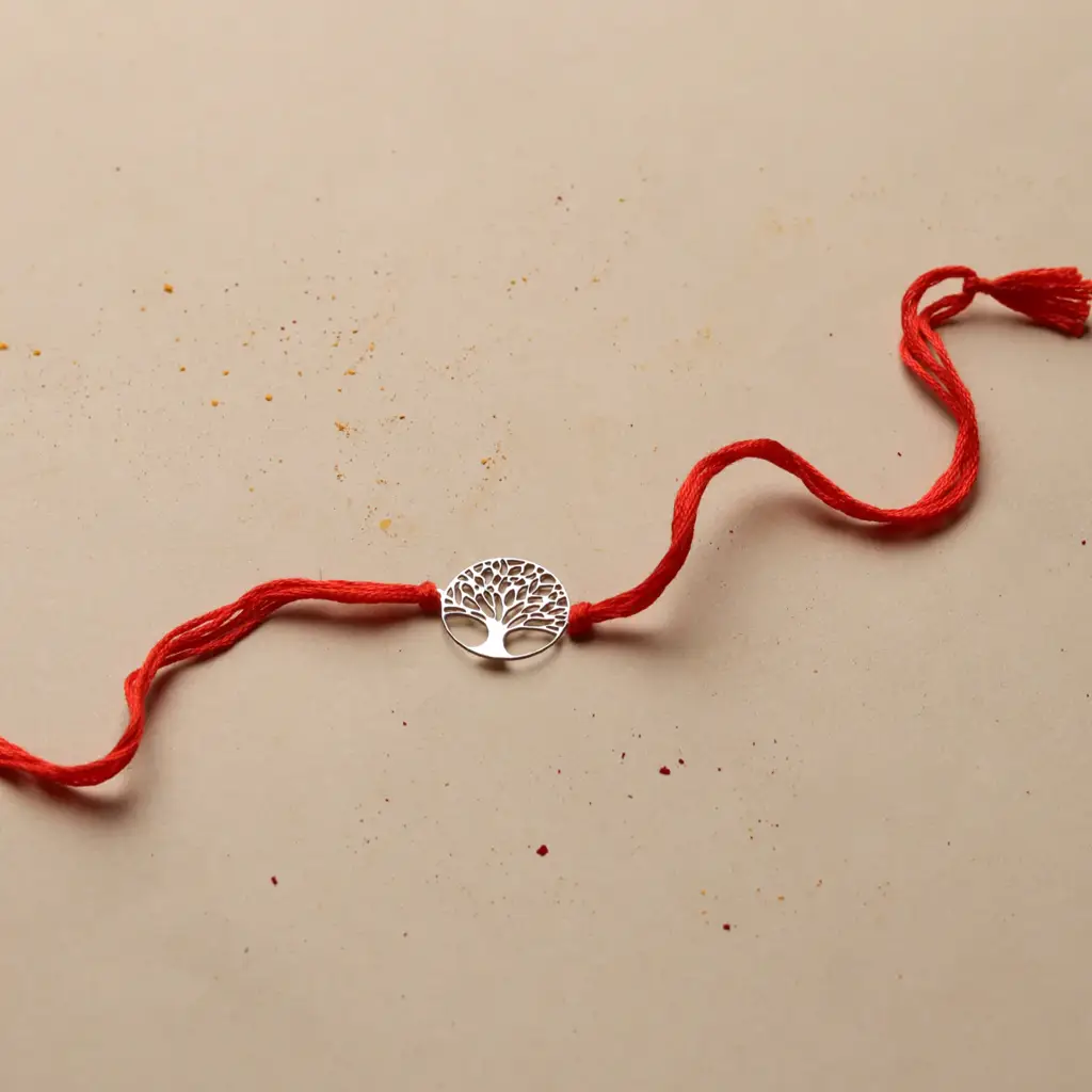Silver Laser Cut Kalpavriksha Rakhi : 74099351