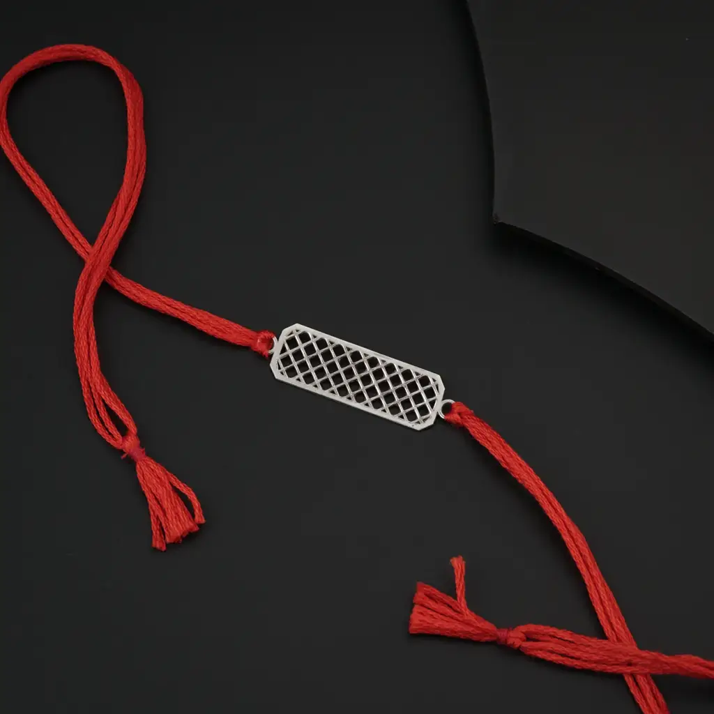 Silver Laser Cut Rakhi : 95084951