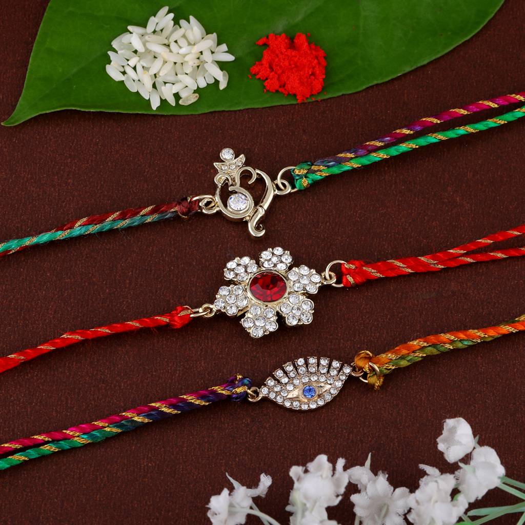 Gold Plated Om And Floral Infinity Shaped Multi Colour Designer Bracelet With Austrian Crystals And Fancy Si : COMBO-239-RAKHI