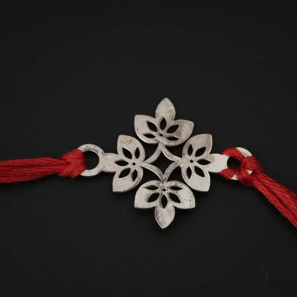 Silver Laser Cut Rakhi : 62005143