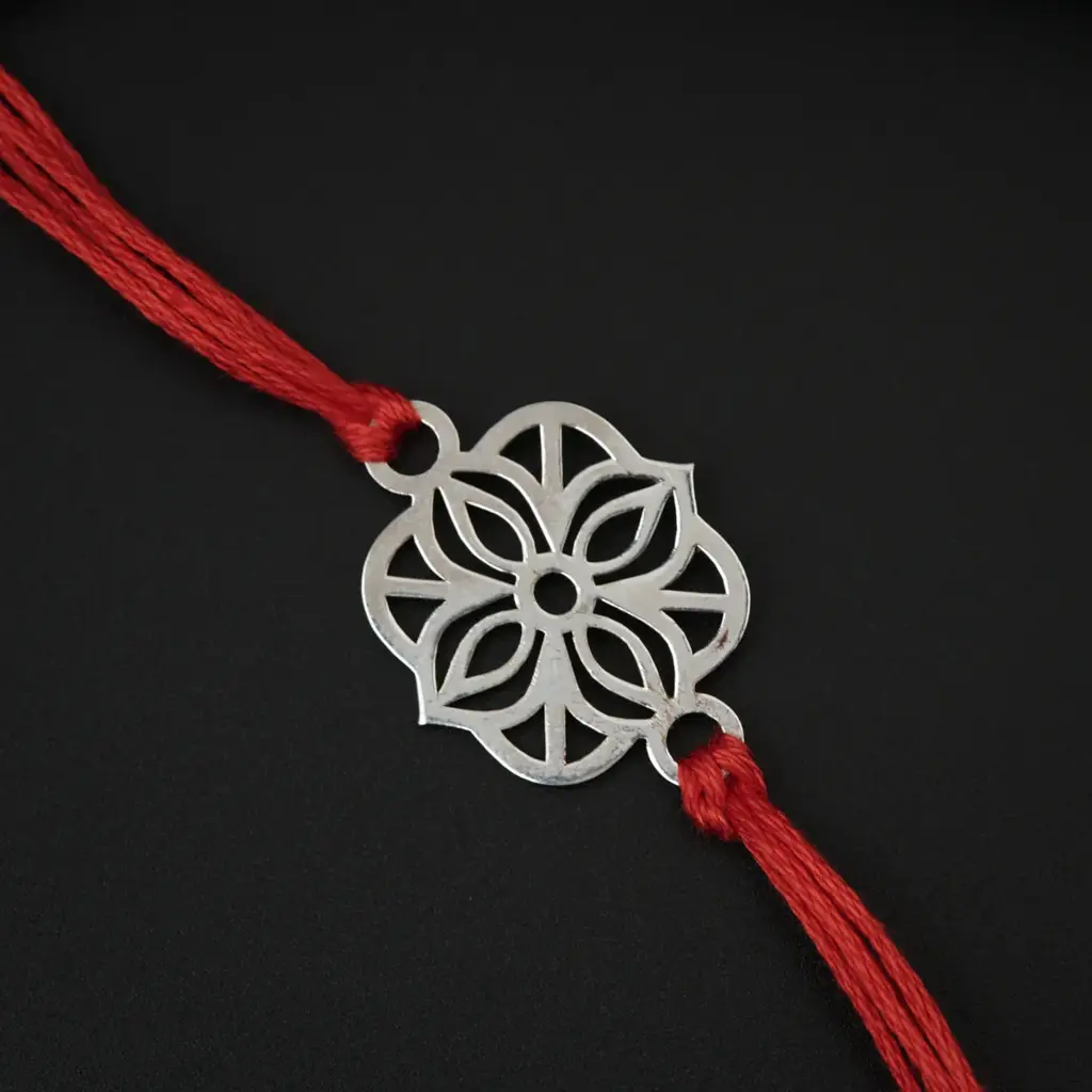 Silver Laser Cut Rakhi : 72147351