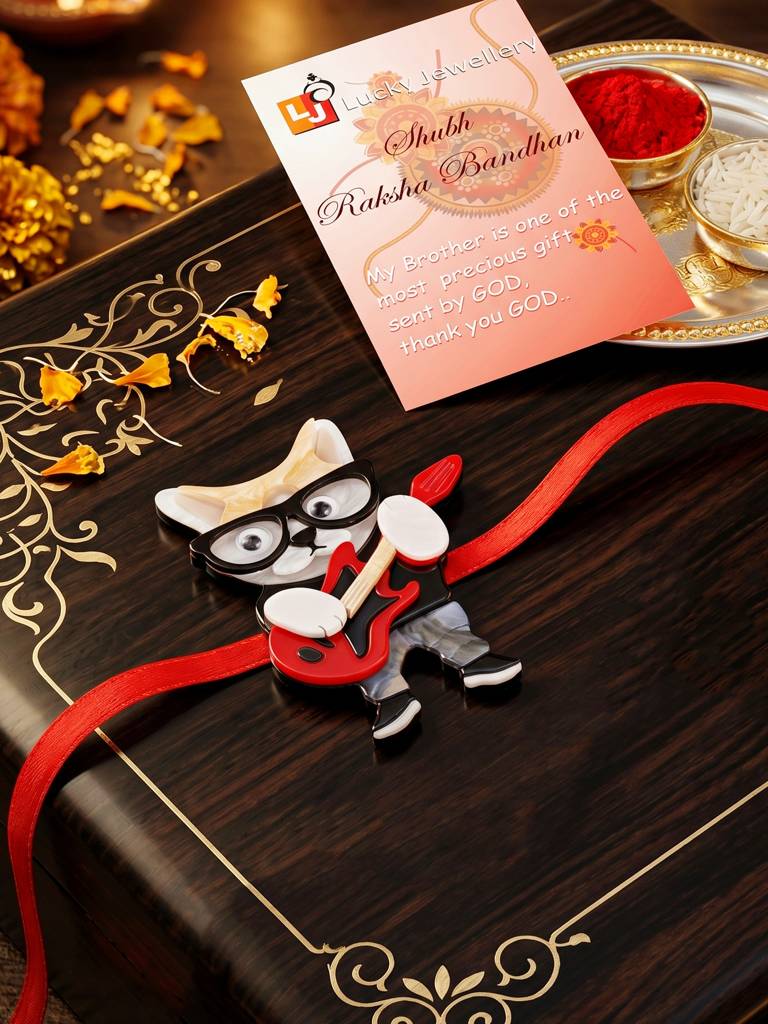 Kids Rakhi: Cute Rockstar Cat Playing Guitar Acrylic Charm On Red Ribbon, Roli, Chawal & Card (440-Chr1 : 440-CHR1-1192-1-2026