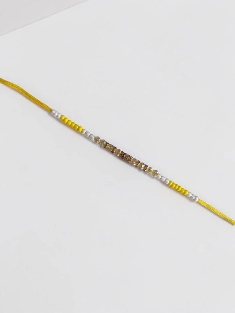 Yellow Color Pop Crystal Thread Rakhi : INH-RKH-YLW