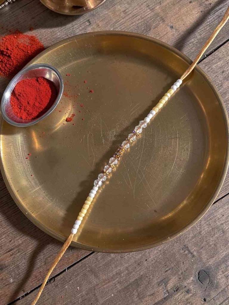 Beige Color Pop Crystal Thread Rakhi : INH-RKH-BEG