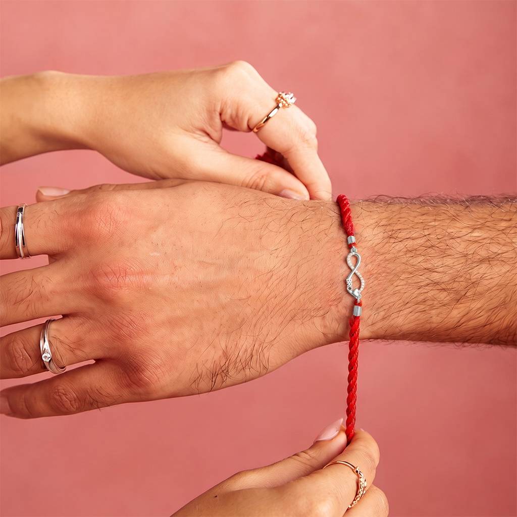 Infinity Bond Cz Rhodium Plated Silver Rakhi (Signature) : RKH-10136-S