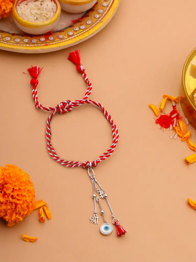 Kicky And Perky 925 Sterling Silver Om And Shree With Evil Eye Stone Lumba Rakhi For Bhabhi